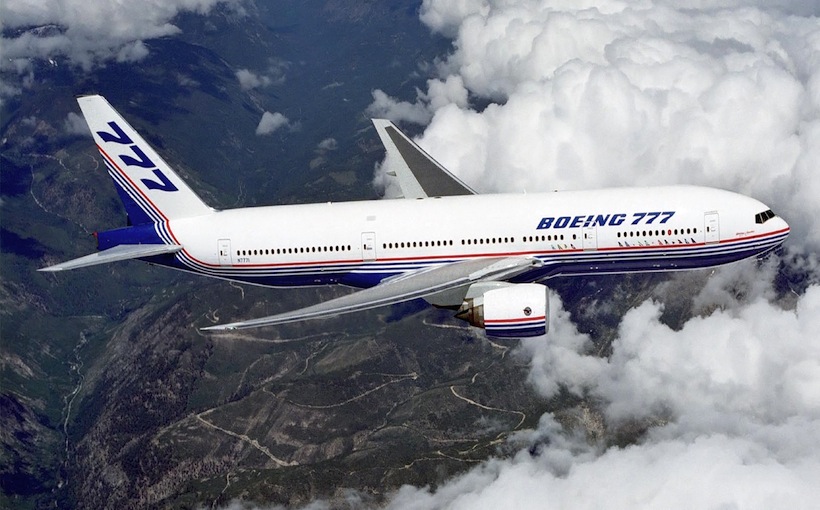 Boeing_777_above_clouds_crop.jpg