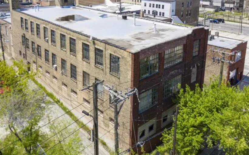 A three-story loft building in the Kinzie Corridor has sold to a local business in sale arranged by Cawley Chicago