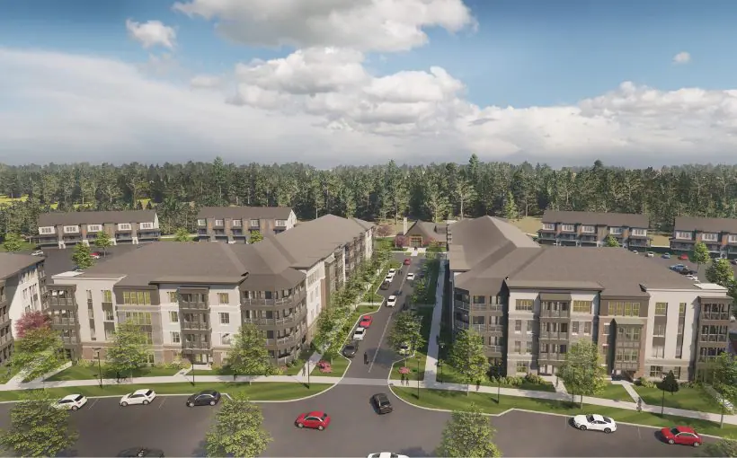 Artist rendering of mirror image mid rise apartment buildings with smaller matching townhome buildings set in front of a forest