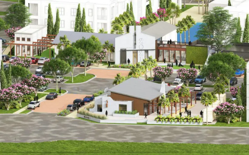 Artist rendering of depicts the entrance into a multifamily complex with the amenity building and leasing building in the forefront