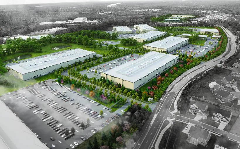 Aerial rendering of multiple industrial buildings with flat roofs