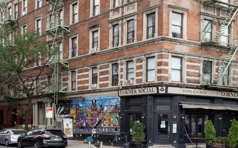 321 Lenox Ave., the home of Harlem's Corner Social Bar, has sold in a deal arranged by JLL