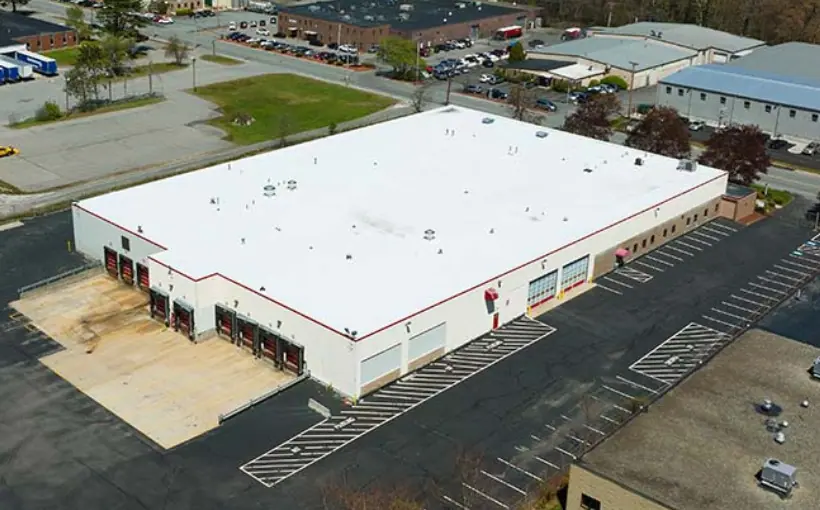 Oliver Street Capital and Bain Capital Real Estate have purchased an industrial building in Lowell, MA for $10.6 million.