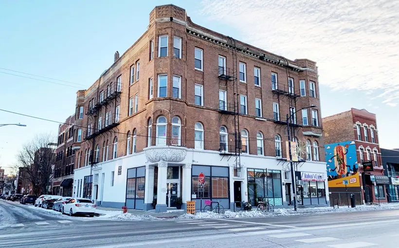 1355 and 1856 W. Chicago Ave., two mixed-use properties in Chicago's West Town neighborhood, have changed hands
