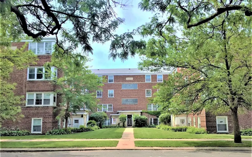 Interra Realty arranged the sale of two adjacent courtyard buildings in Chicago's Budlong Woods neighborhood to a local buyer