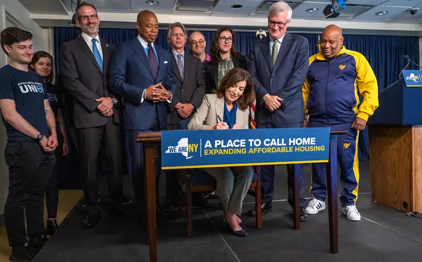 Gov. Kathy Hochul signed legislation June 7 to facilitate conversion of underutilized Class B hotels into affordable housing