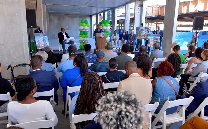 The developers of 43 Green on Chicago's South Side joined city leaders to commemorate the topping-off of construction on the project's first phase