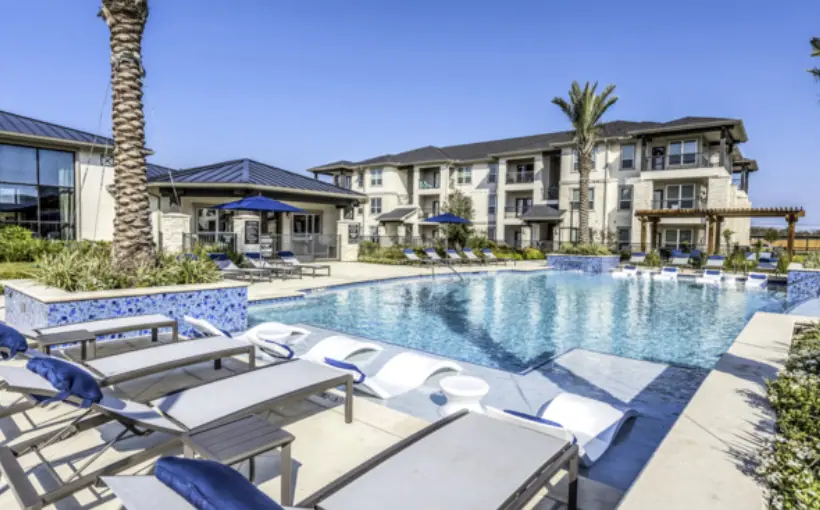 Koontz Corporation builds and sells 340-unit Encino Trace Apartments to SB Pacific Corp. in same year.