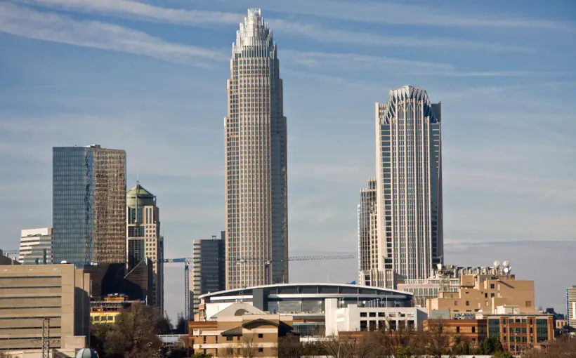 The Atlantic Coast Conference has signed a lease with Highwoods Properties at Bank of America Tower in Charlotte, NC for its corporate headquarters.