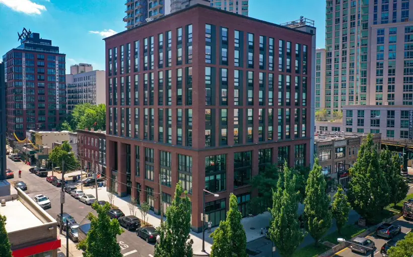 Jackson Square is a nine-story mixed-use property in Long Island City, up for sale at $65 million.