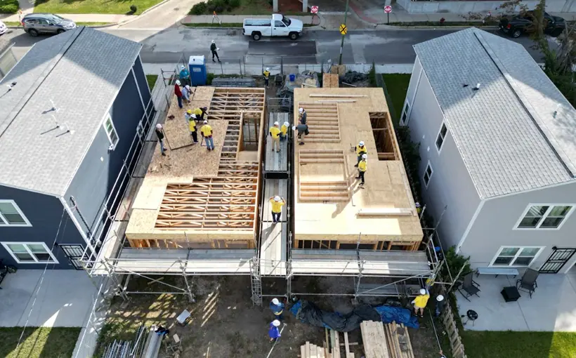 Baird & Warner employees recently assisted Habit for Humanity Chicago in construction projects on Chicago's South Side