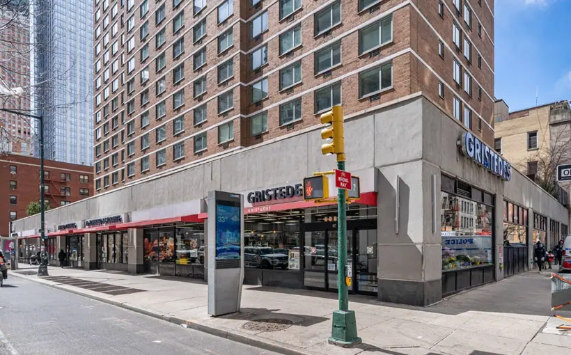 897 Eighth Ave. in Midtown Manhattan is a grocery-anchored retail and parking condo