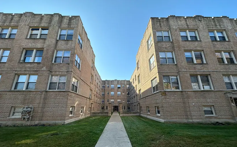 The Chase Court is a century-old courtyard apartment building in Chicago's Rogers Park neighborhood