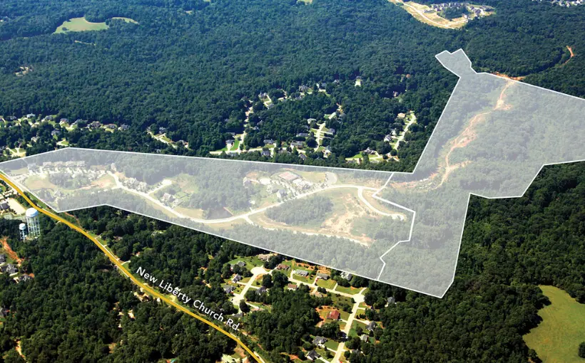 Walton Global and Fischer Homes have completed the transfer of a 70-acre parcel in Braselton, GA to construct The Reserve at Liberty Park housing development.