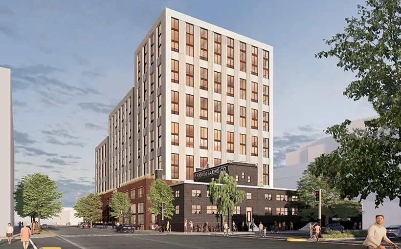JLL secured nearly $74 million in construction financing for a mass timber apartment development in Madison, Wisconsin