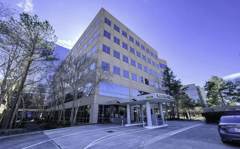 Woodforest Bank buys twin office buildings in Woodlands