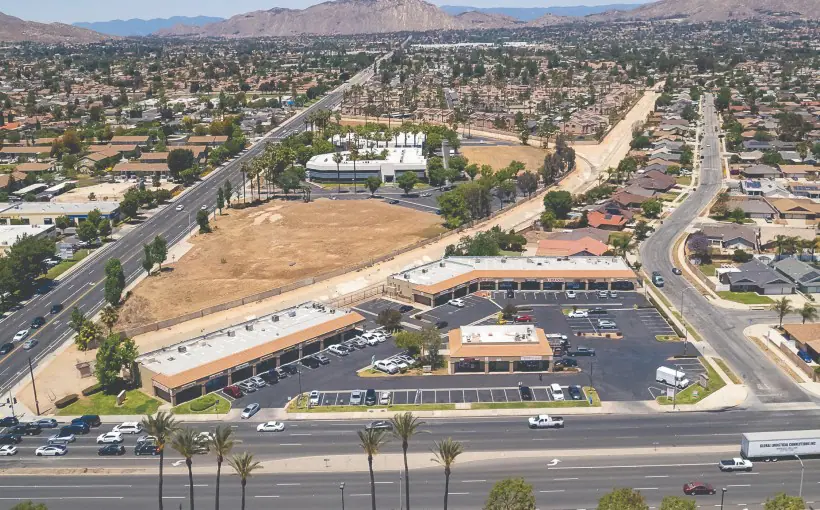 Faris Lee arranged the sale of a strip shopping center in Moreno Valley, California at below replacement cost