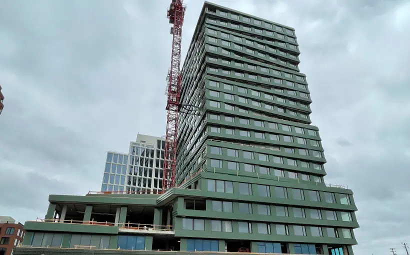 The San Francisco Giants and Tishman Speyer topped out construction on Parcel F, a multifamily tower in San Francisco’s Mission Rock neighborhood