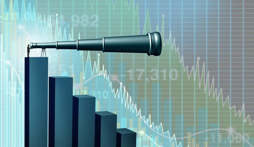 Man with telescope on top of business graph
