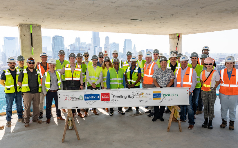 Sterling Bay Tops Out 28-Story Residential Development Leading Chicago-Based Developer Celebrates Project Milestone, Reaching 28-Stories at New Amenity-Rich Residential Development Sterling Bay recently celebrated the structural completion of 225 N Elizabeth, the firm’s latest residential development in Fulton Market