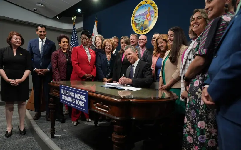 California Gov. Gavin Newsom signed into law a slate of bills to accelerate approval and construction of infrastructure projects