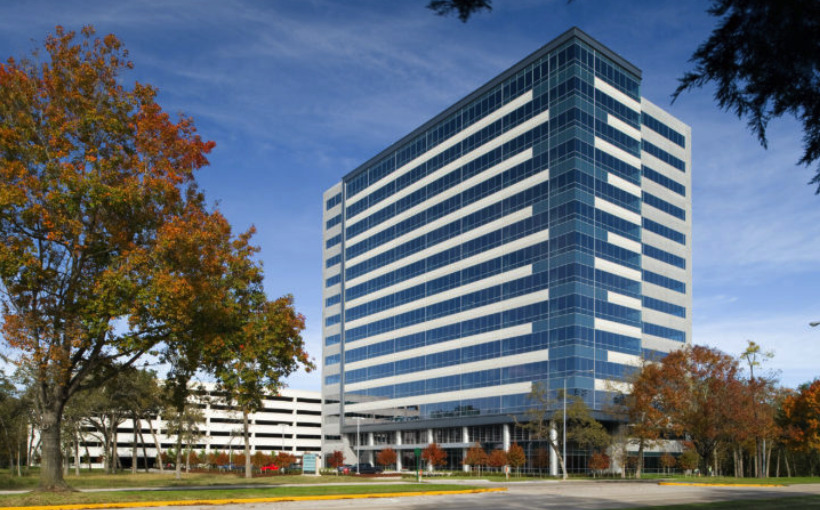 Global Cos. moves HQ, cut rental space in half.