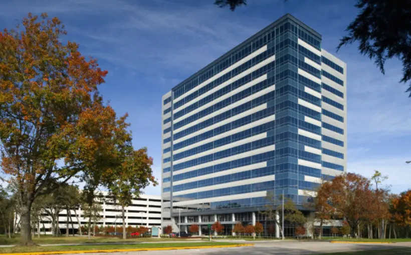 Global Cos. moves HQ, cut rental space in half.
