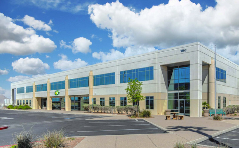 Henderson grocer HQ building sells.