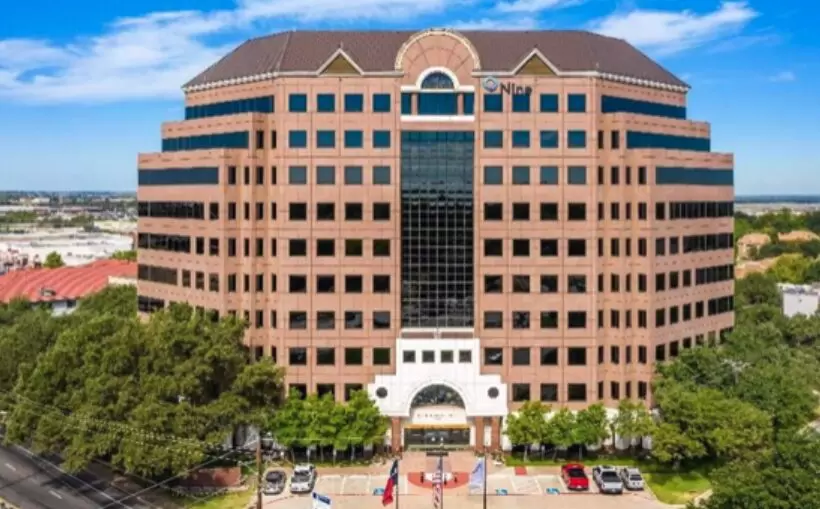 One Bridgmar Center picked up by Wilks