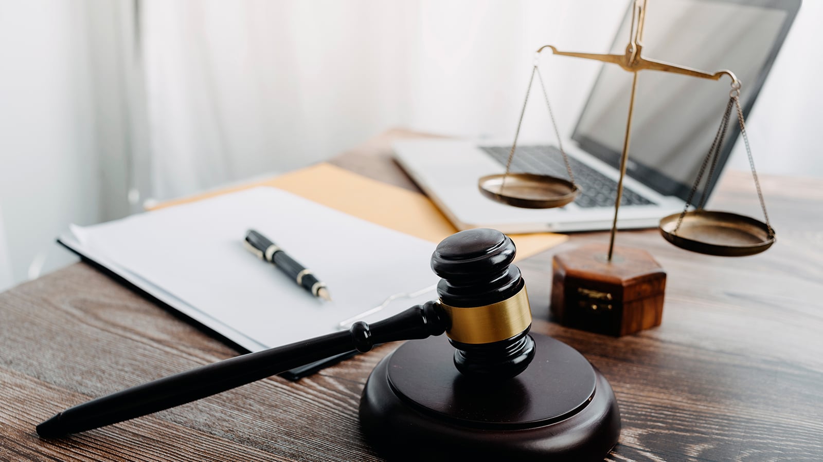 Business,And,Lawyers,Discussing,Contract,Papers,With,Brass,Scale,On